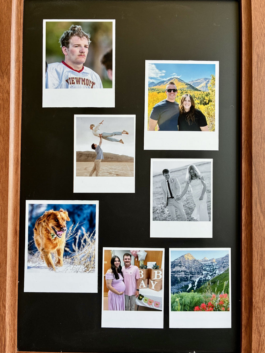 Collage of various photos on a black board with wooden frame